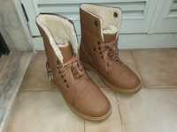 Botas cano alto com pelo