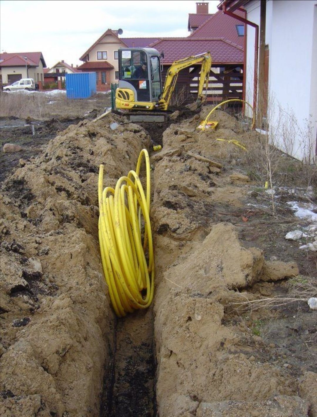 Przyłącza sieci koparko ładowarka woda gaz drenaż kanalizacja drenaż