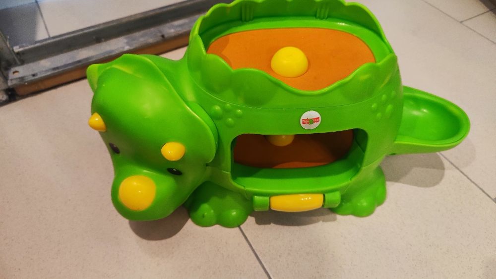 Zabawka sensoryczna wibrujący dinozaur fisher Price
