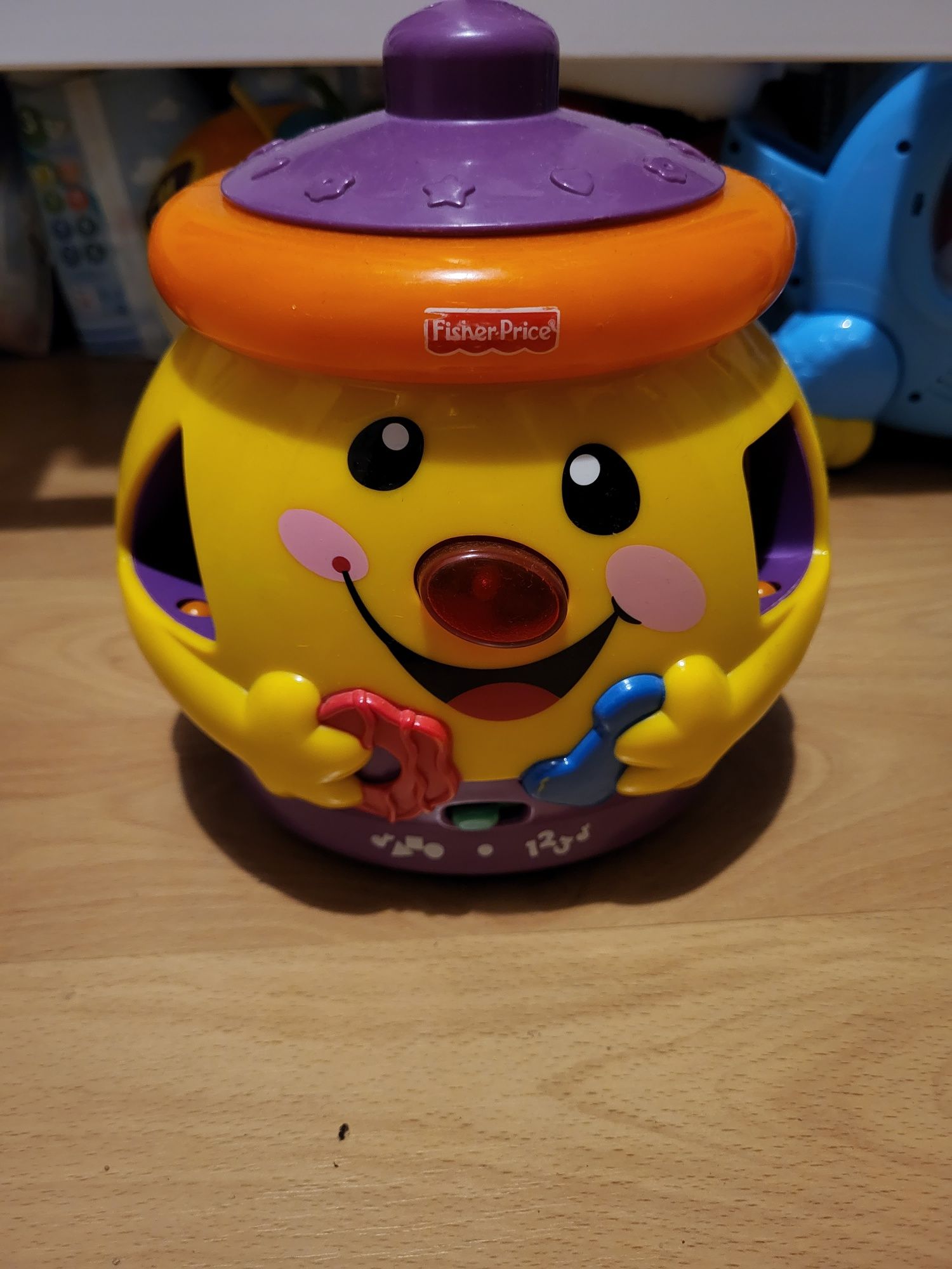 Garnuszek na klocuszek Fisher price