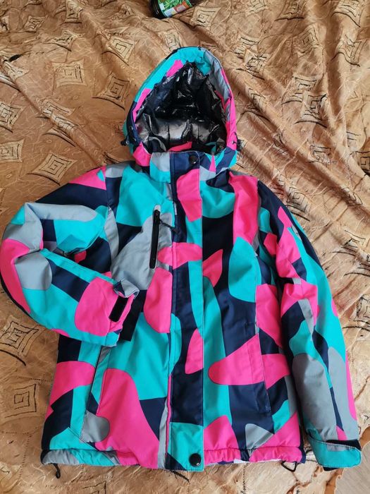 Тепла  куртка на дівчинку