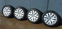Koła z kołpakami VW 185/60 R15 opony Firestone