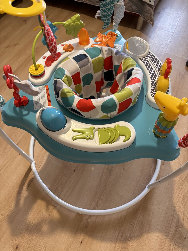 Дитячі стрибунці пригунки fisher price (розвиваючий центр)