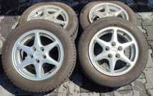 14" 6J 5x100 Komplet felg aluminiowych z oponami letnimi.