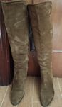 Botas em pele de mulher