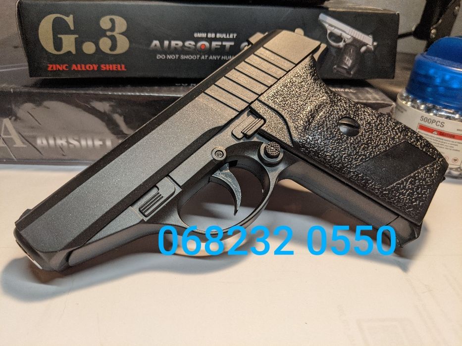 Металевий пістолет на пульках іграшкова зброя