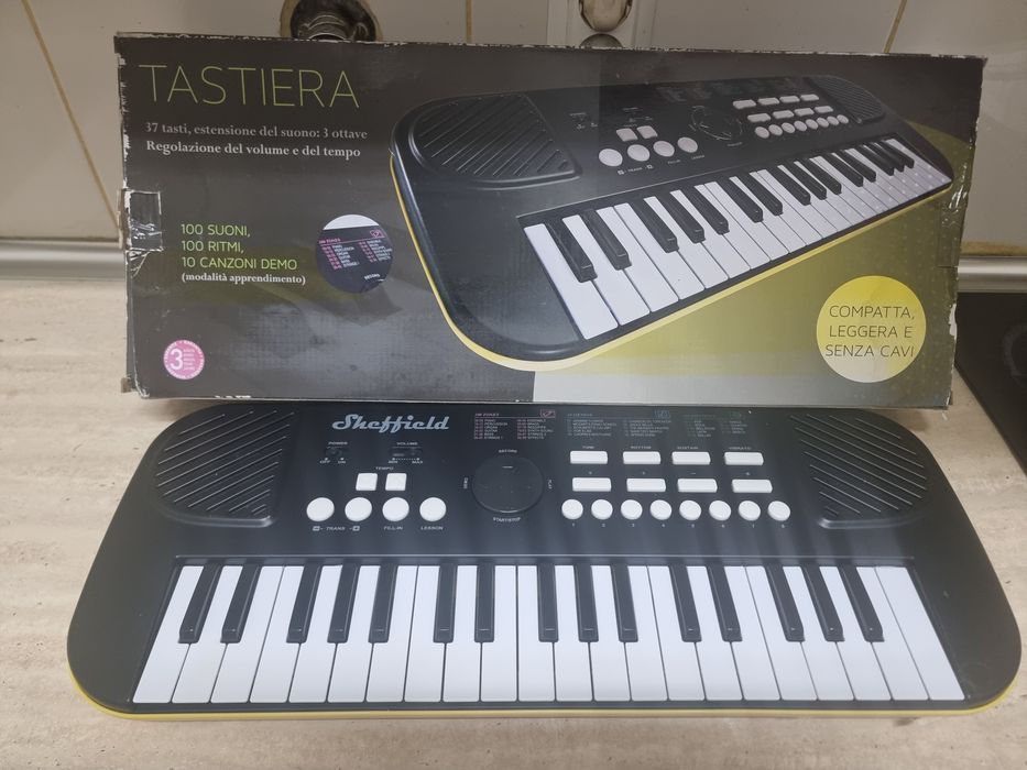 Teclado musical portátil