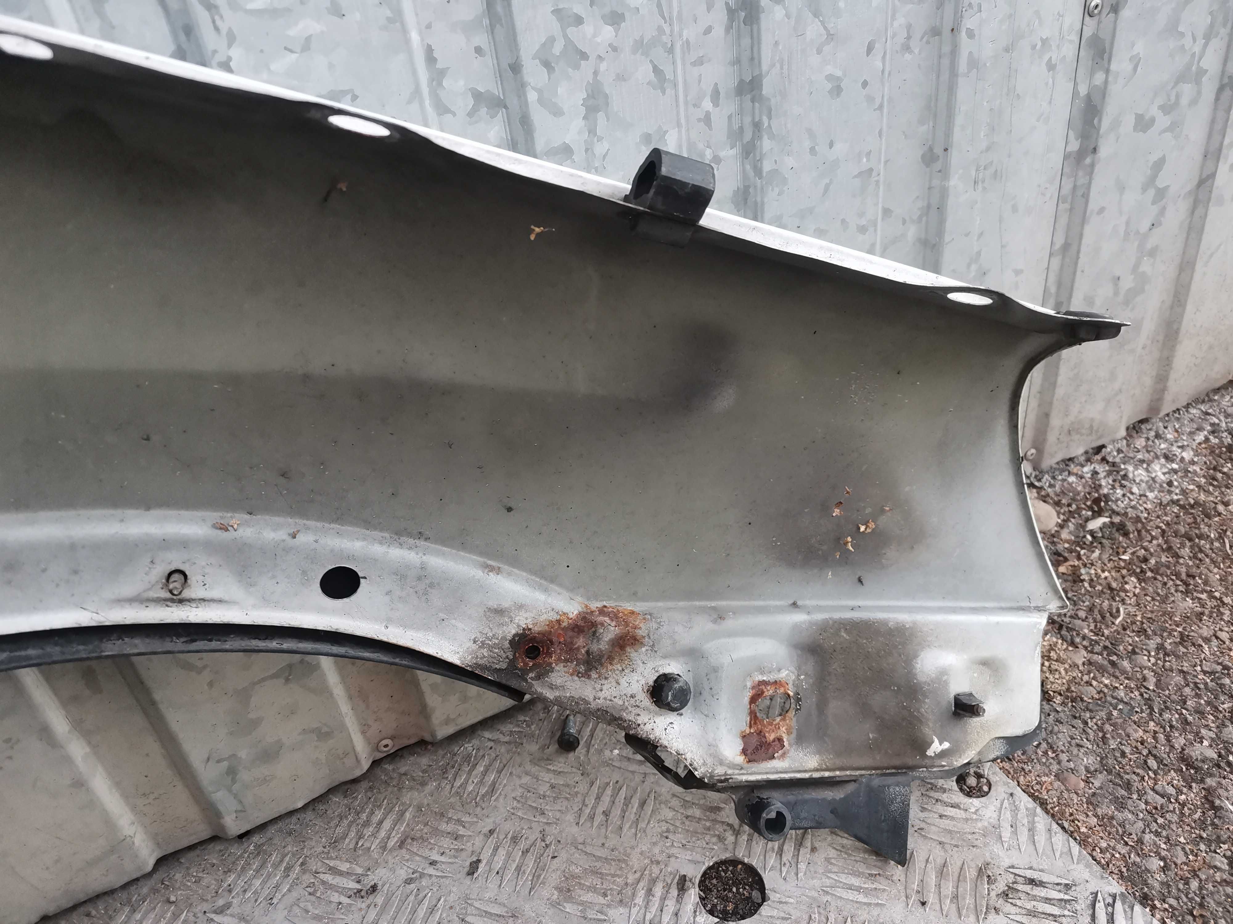 Opel Corsa C Błotnik lewy przód LP