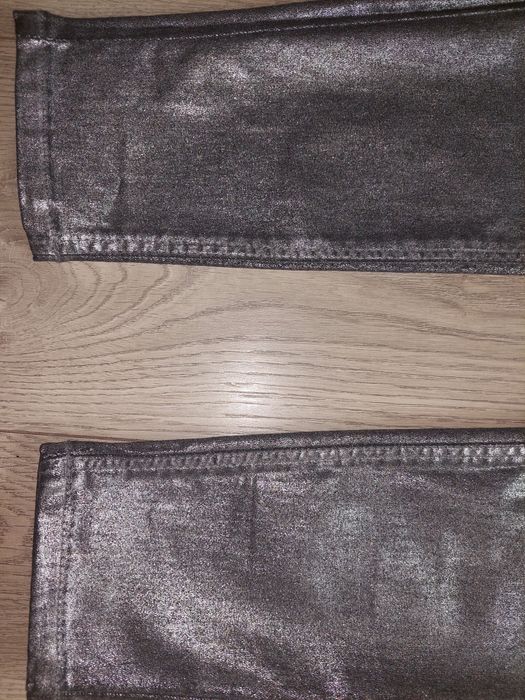 Srebrne jeansy damskie r.36 sinsay