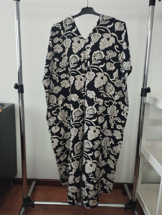 Saída de praia com decote em bico