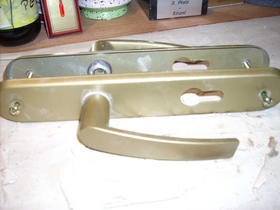 klamki szyldy do drzwi