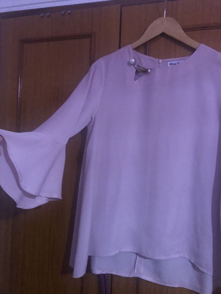 Blusa rosa velho clara