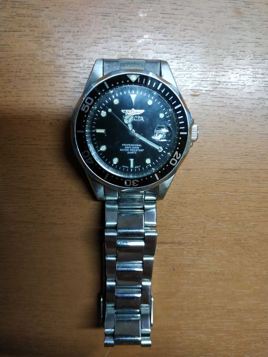 Часы б/у Invicta-кварц-мужские-на ходу в отличном состоянии