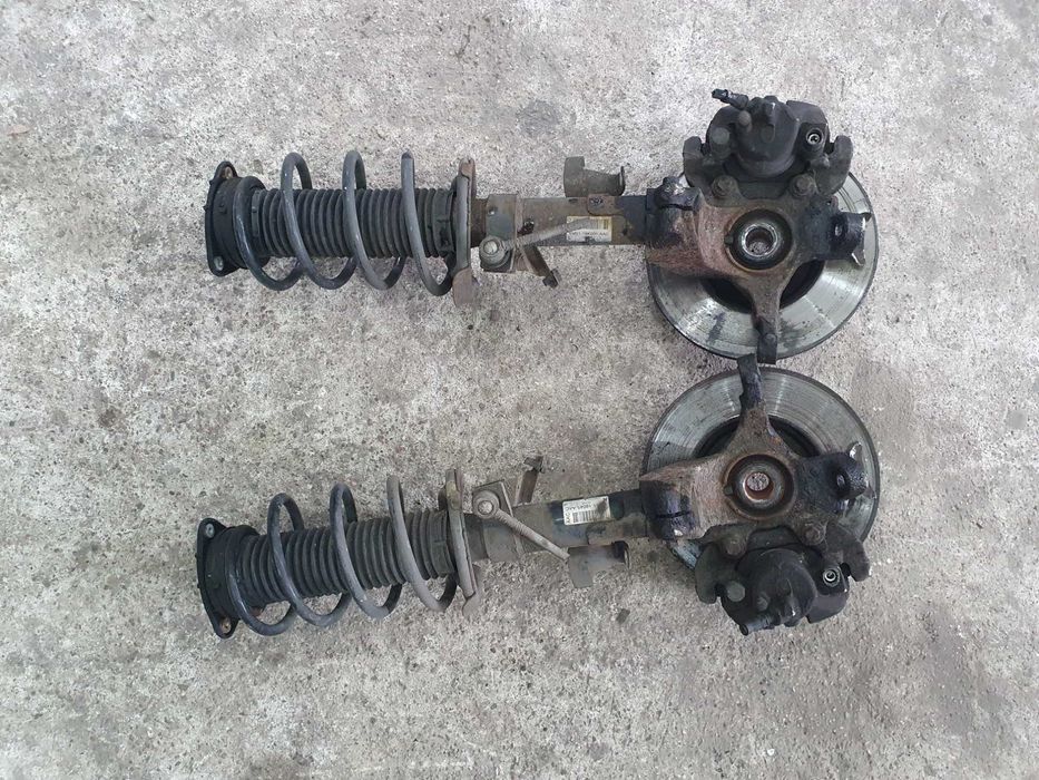 Amortyzator piasta zwrotnica spreżyna przód Ford Focus mk2 lift 1.4