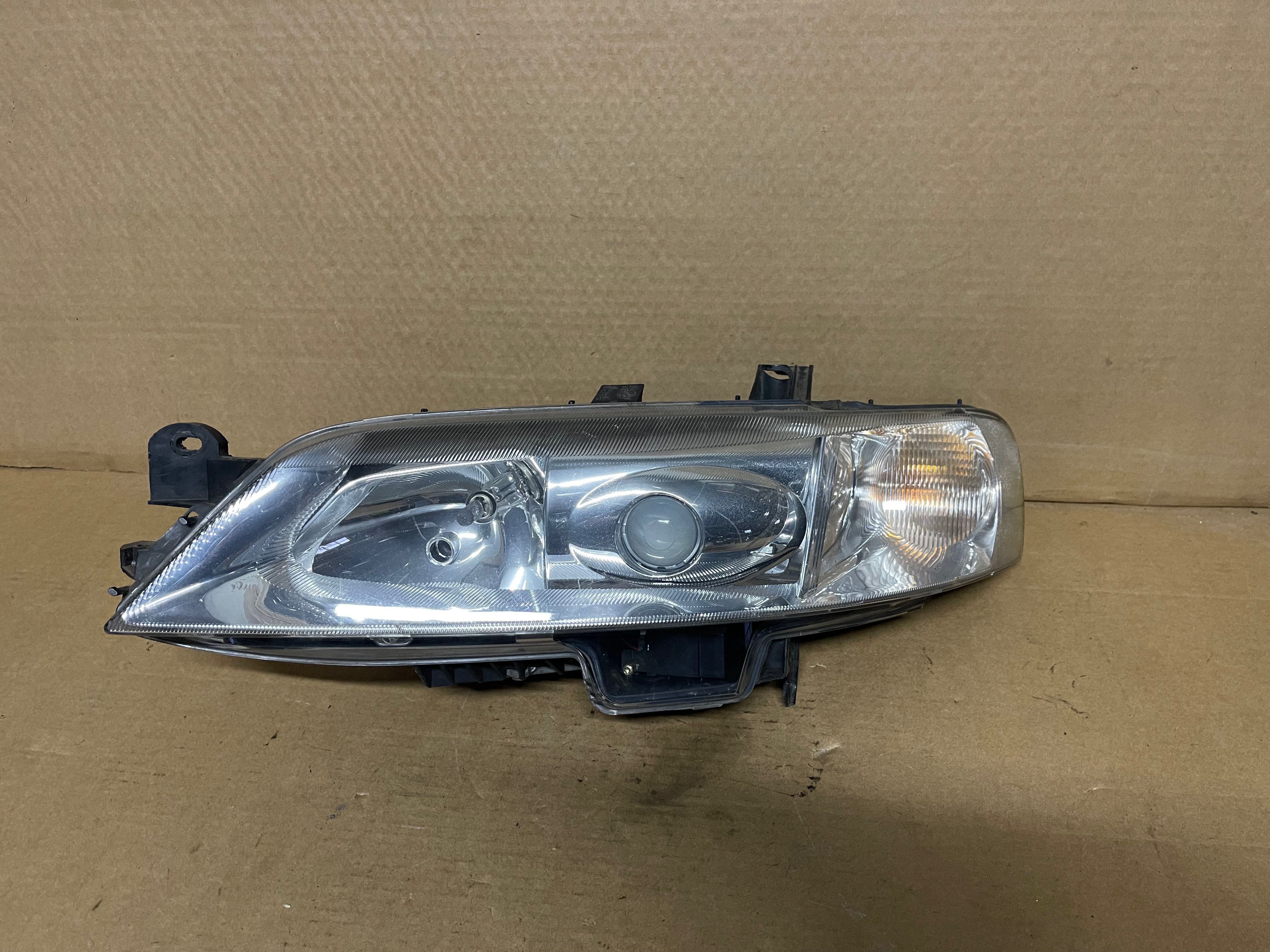 FAROL OPTICA XENON FRENTE ESQUERDA OPEL VECTRA B 1999 A 2002