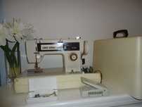 Máquina de costura Singer/Pouco uso/Ótimo estado