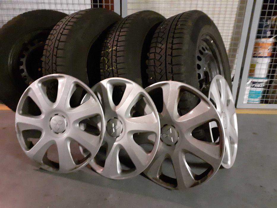 Koła zimowe Continental 215/70/R 16 T + kołpaki Mitsubishi