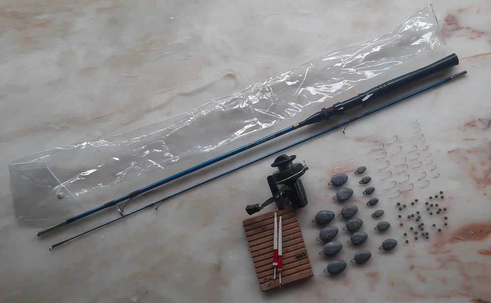 Cana de Pesa e carreto DAIWA com acessórios