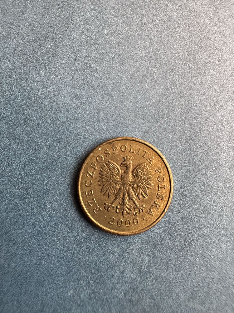 Dwie stare monety 50 groszy z 1983 roku oraz 1 grosz z 2000 roku PRL