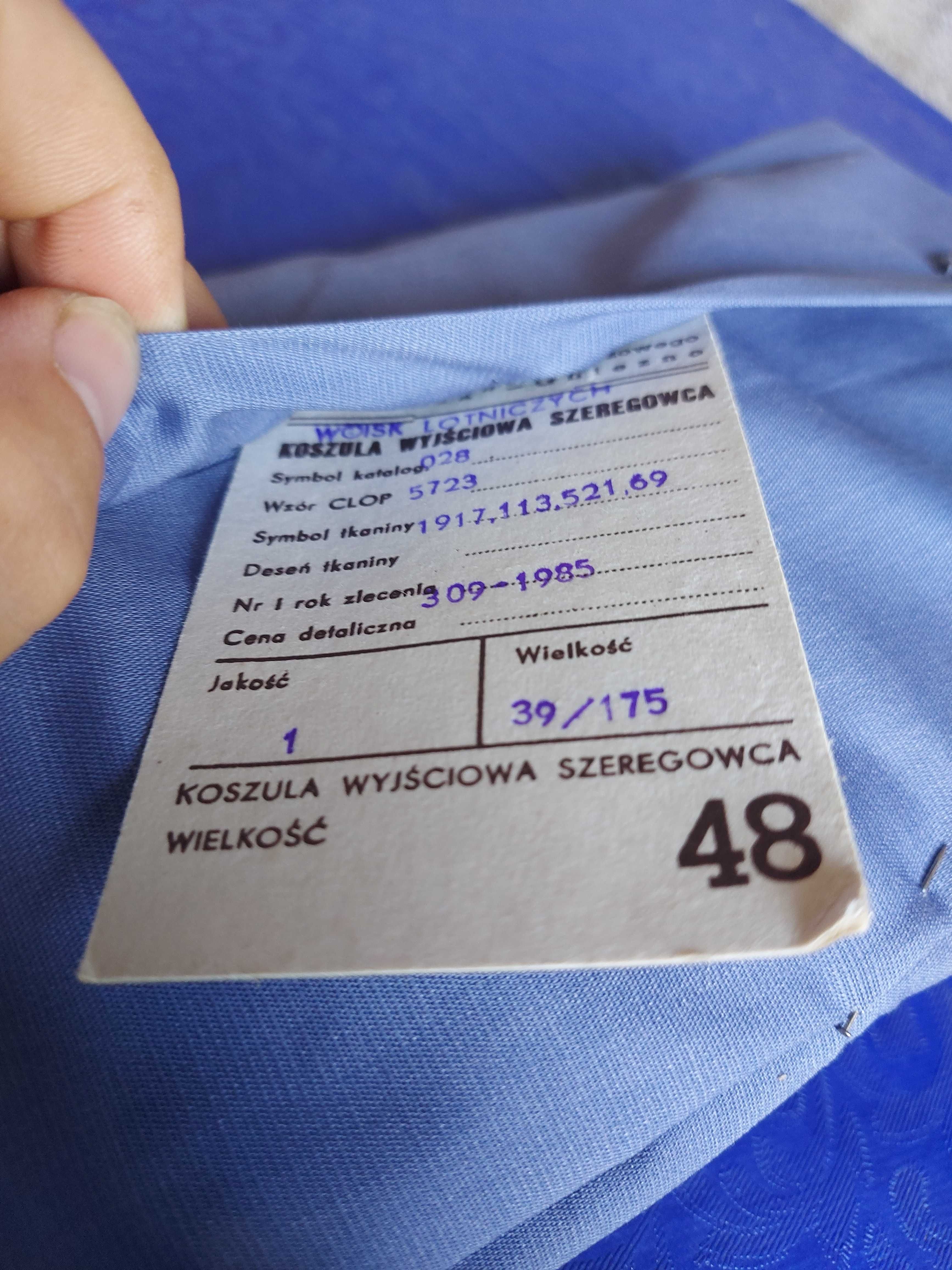 Koszula PRL . Stan magazynowy. Kolor niebieski , rozmiaru 40/180