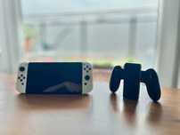 Nintendo Switch OLED, stan bardzo dobry + pokrowiec