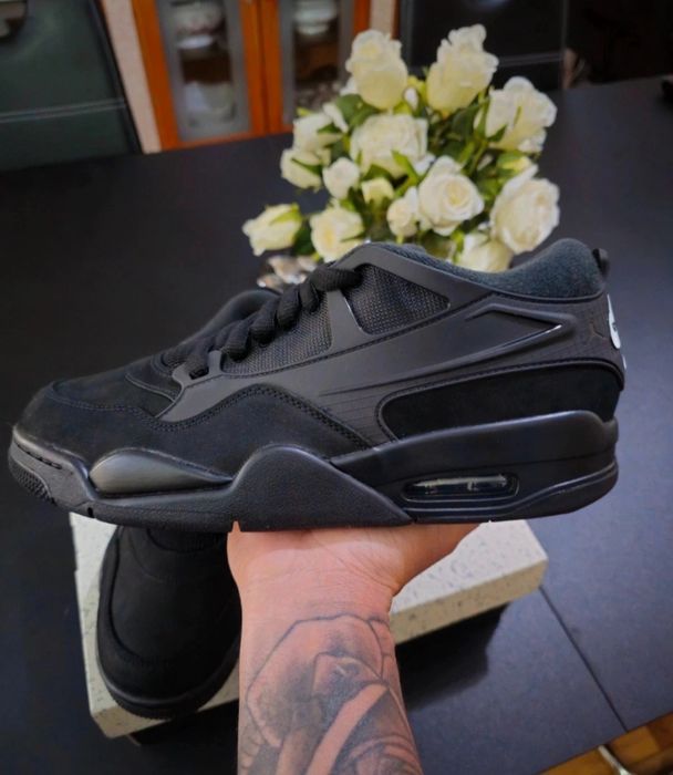 Jordan 4 RM Black Cat