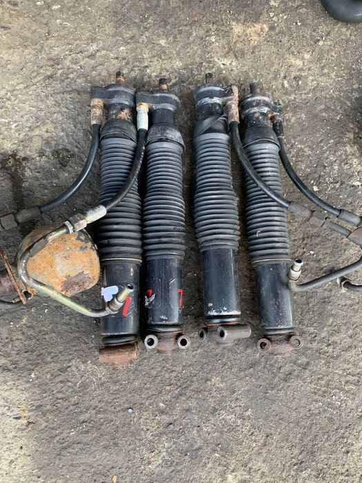 Амортизатори,груші, стойки гідропідвіски w210,124