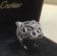 Золоте кільце з 545 діамантами, 2 ізумрудами та оніксом. Cartier