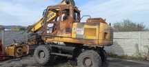 Komatsu PW 160 7E0 siłownik zwolnica rozdzielacz pompa most