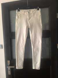Białe spodnie rurki damskie House r.M