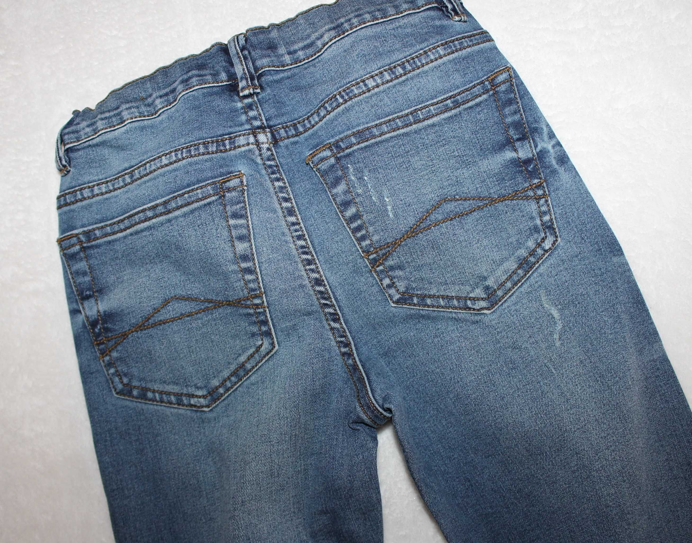 Skinny spodnie jeans r.134 niebieskie