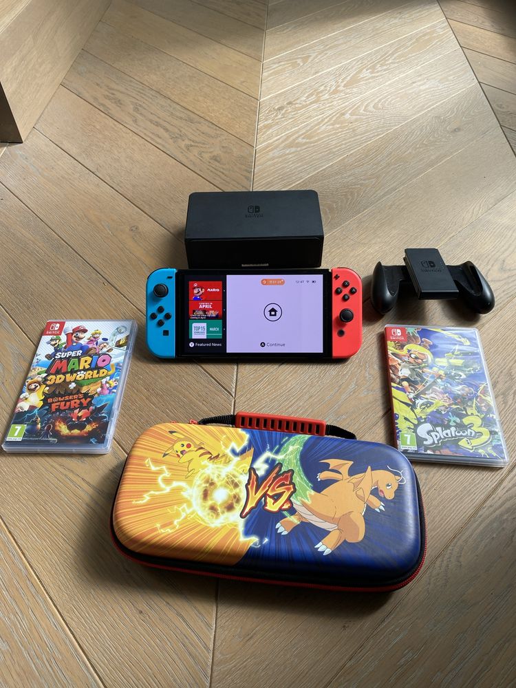 Nintendo Switch OLED (+futerał, gry; stan idealny)