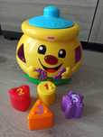 Garnuszek na klocuszek Fisher Price