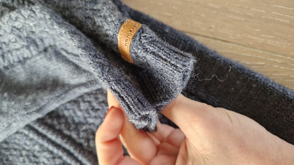 Kombinezon 100% merino gruby rozm. 110 Name it