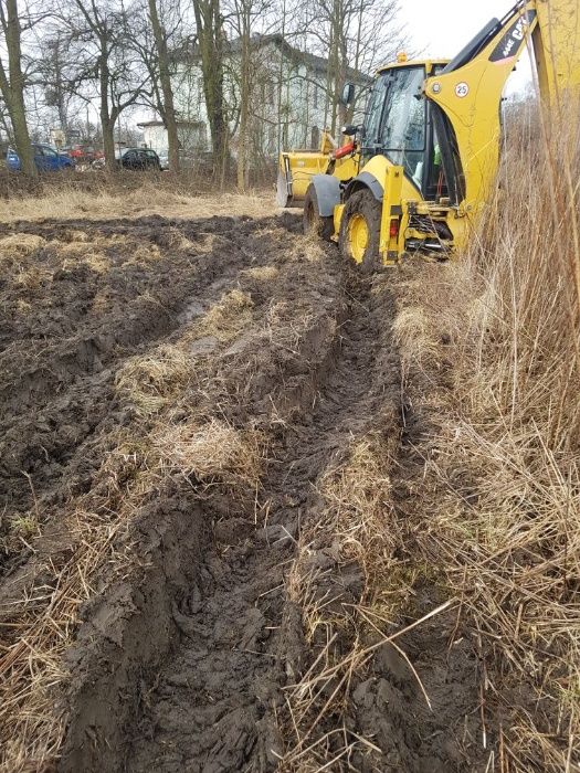 Koparko-ładowarka caterpillar 444e,wykopy ,prace ziemne