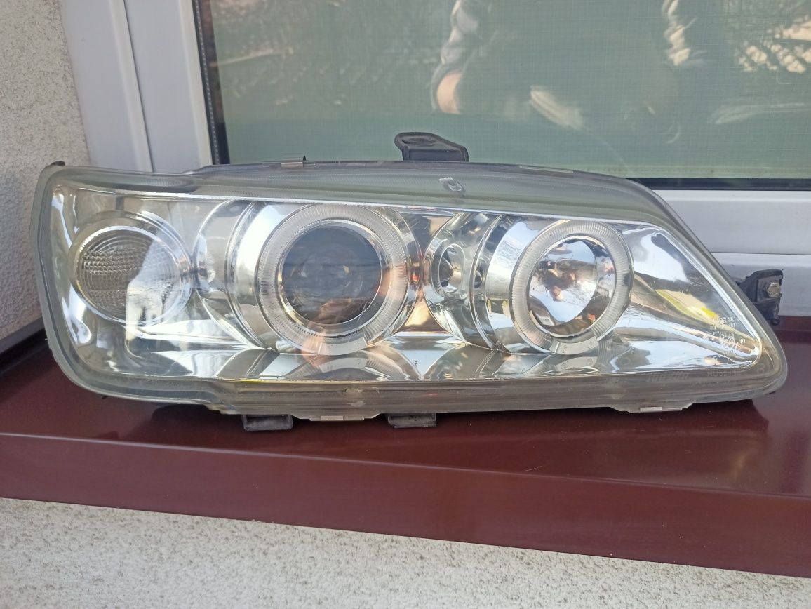 Peugeot 306 lampy przednie reflektory soczewki ringi tuning