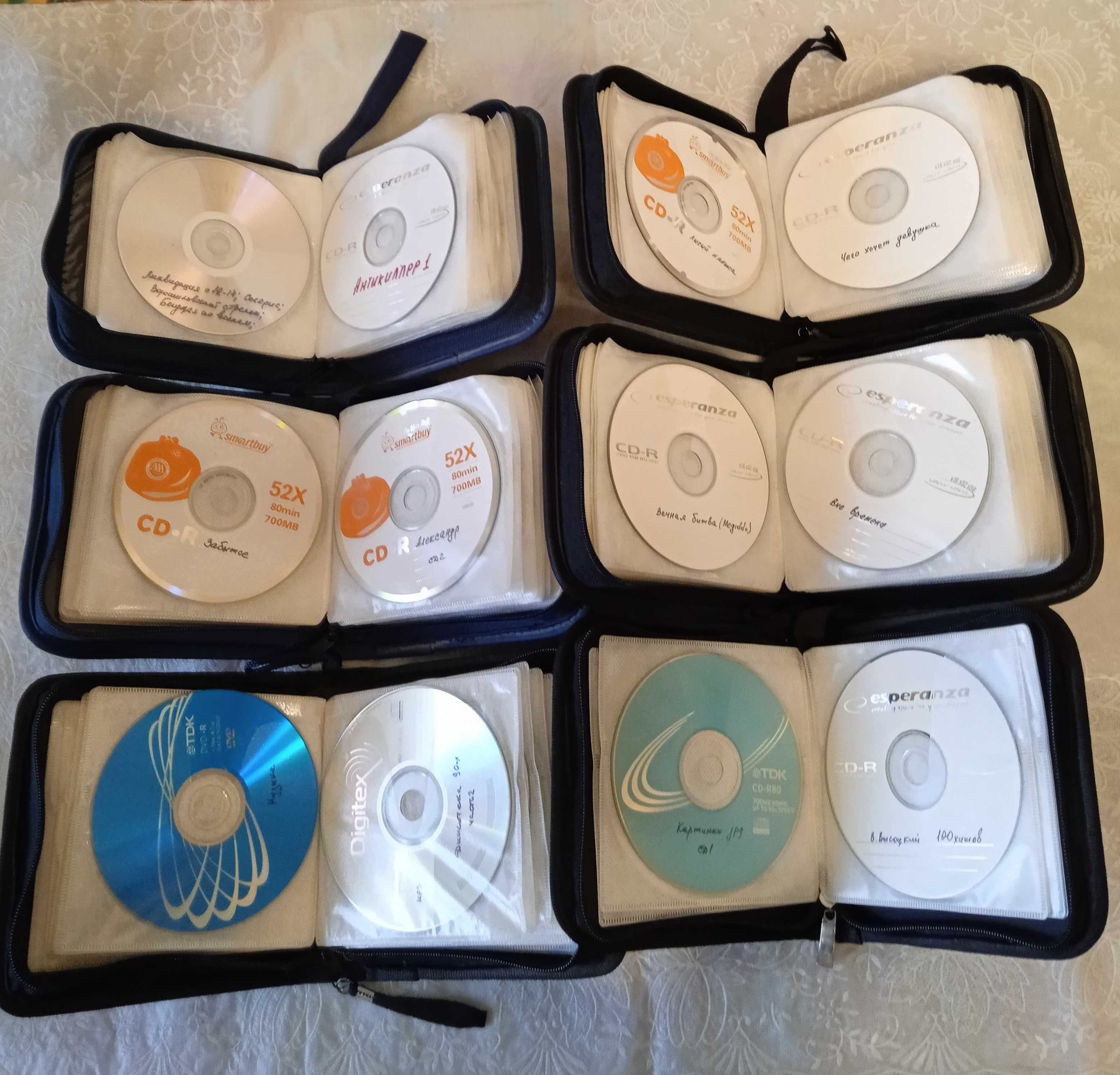 Фильмы на дисках CD, DVD в сумках кейсах по 40 дисков. сумки.