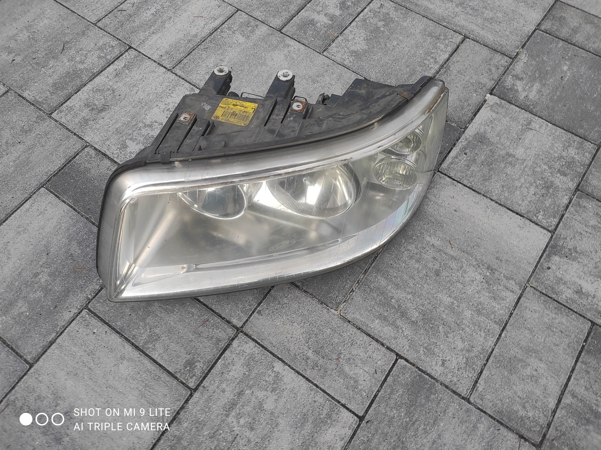 Lampa reflektor przedni przód Volkswagen Transporter T5 Oryginał Europ