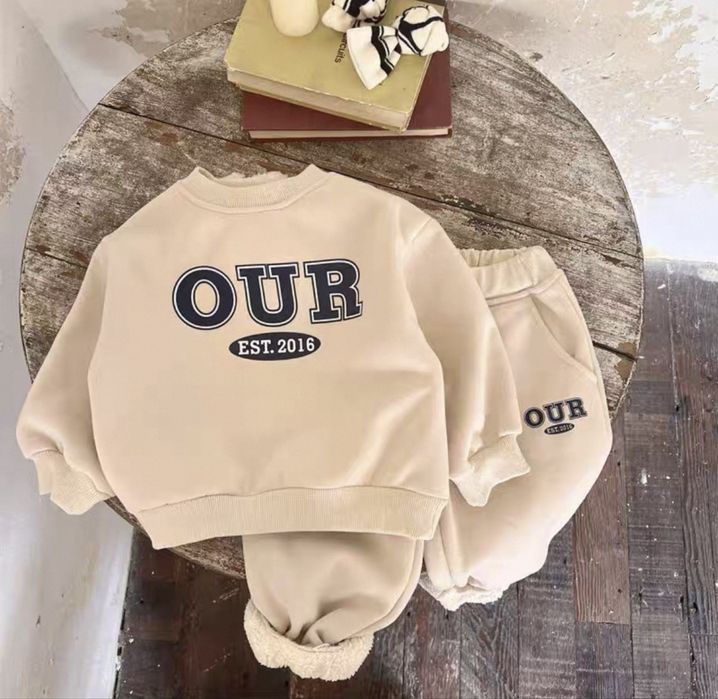 Продам утеплений штучним хутром костюм