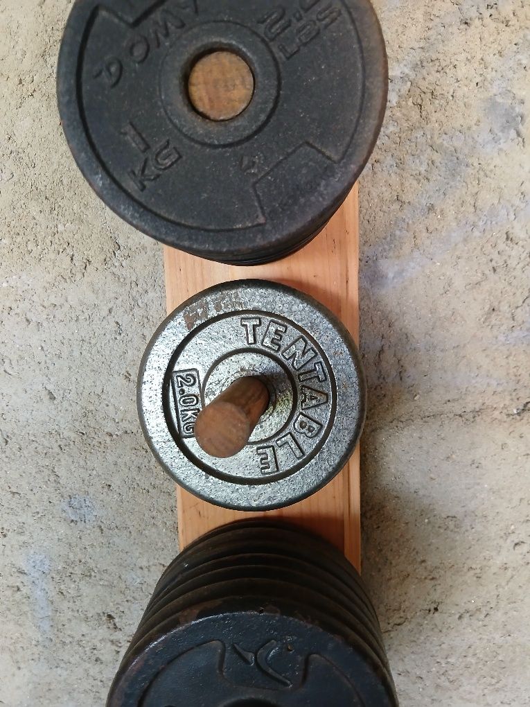 Pesos de 28mm para musculação