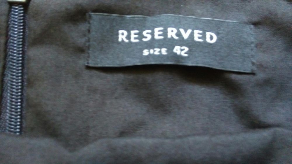 Czarna spodnica Reserved 42