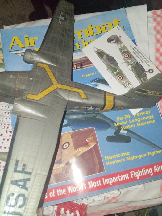 Revista avião e postal da Parker