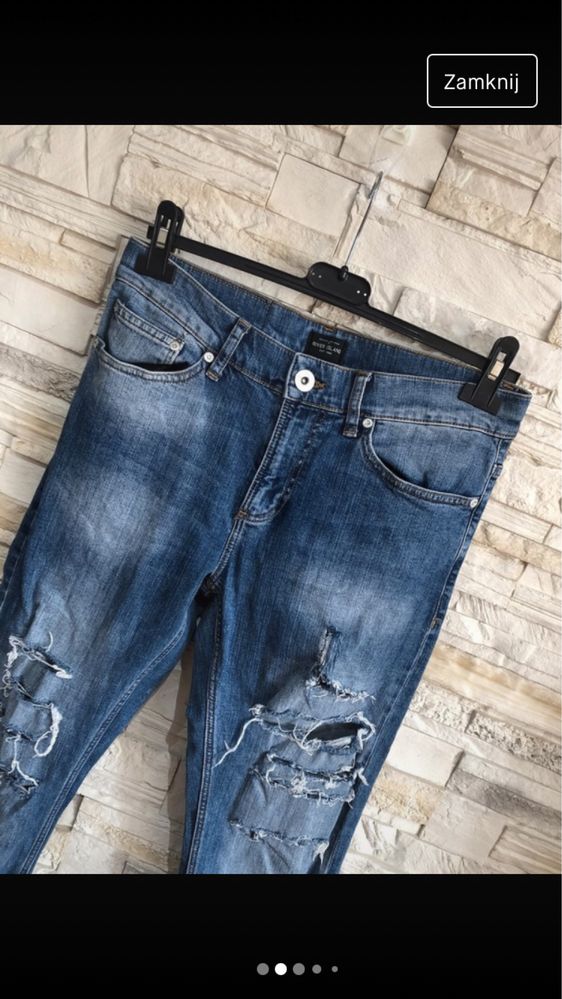 Spodnie dżinsowe  jeans  River Island  W30 L32 z dziurami  przetarcia