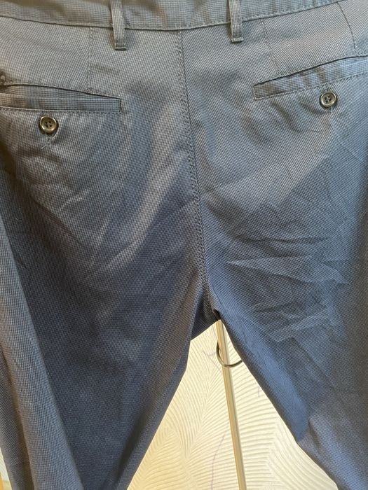 Брюки темно синие в мелкую клетку на мужчину или подростка