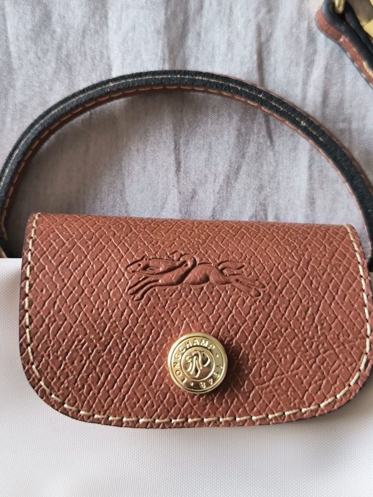 Longchamp bege tamanho xs