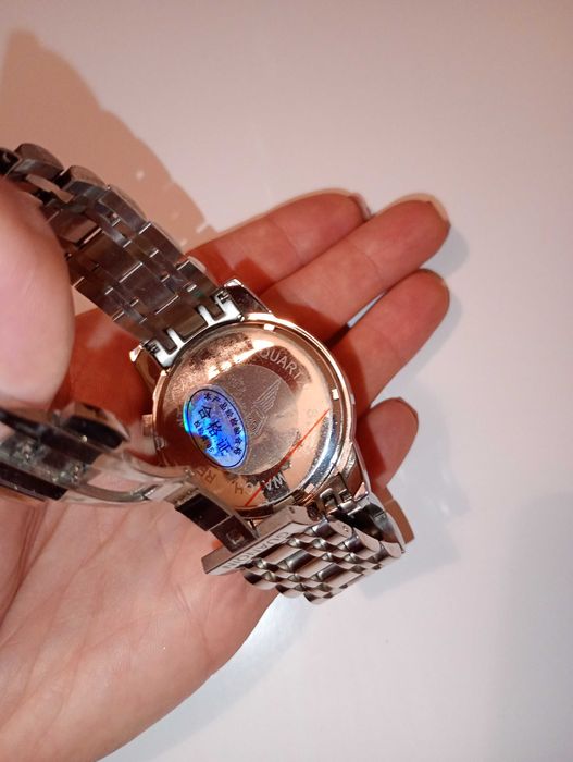 Годинник новий Guanqin