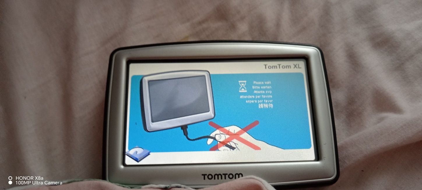 Навігатор Tom Tom