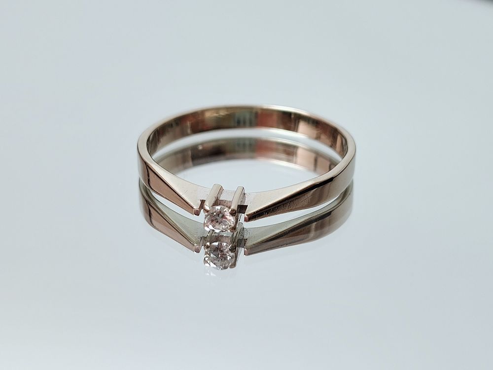 Złoty pierścionek z diamentem białe złoto 585 R.12