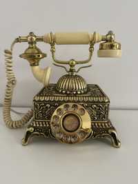 Telefone antigo dourado