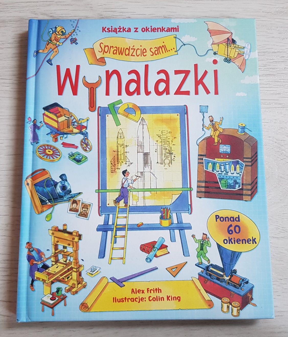 Wynalazki książka z okienkami